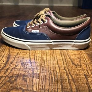 Blue and brown vans lace up shoes.